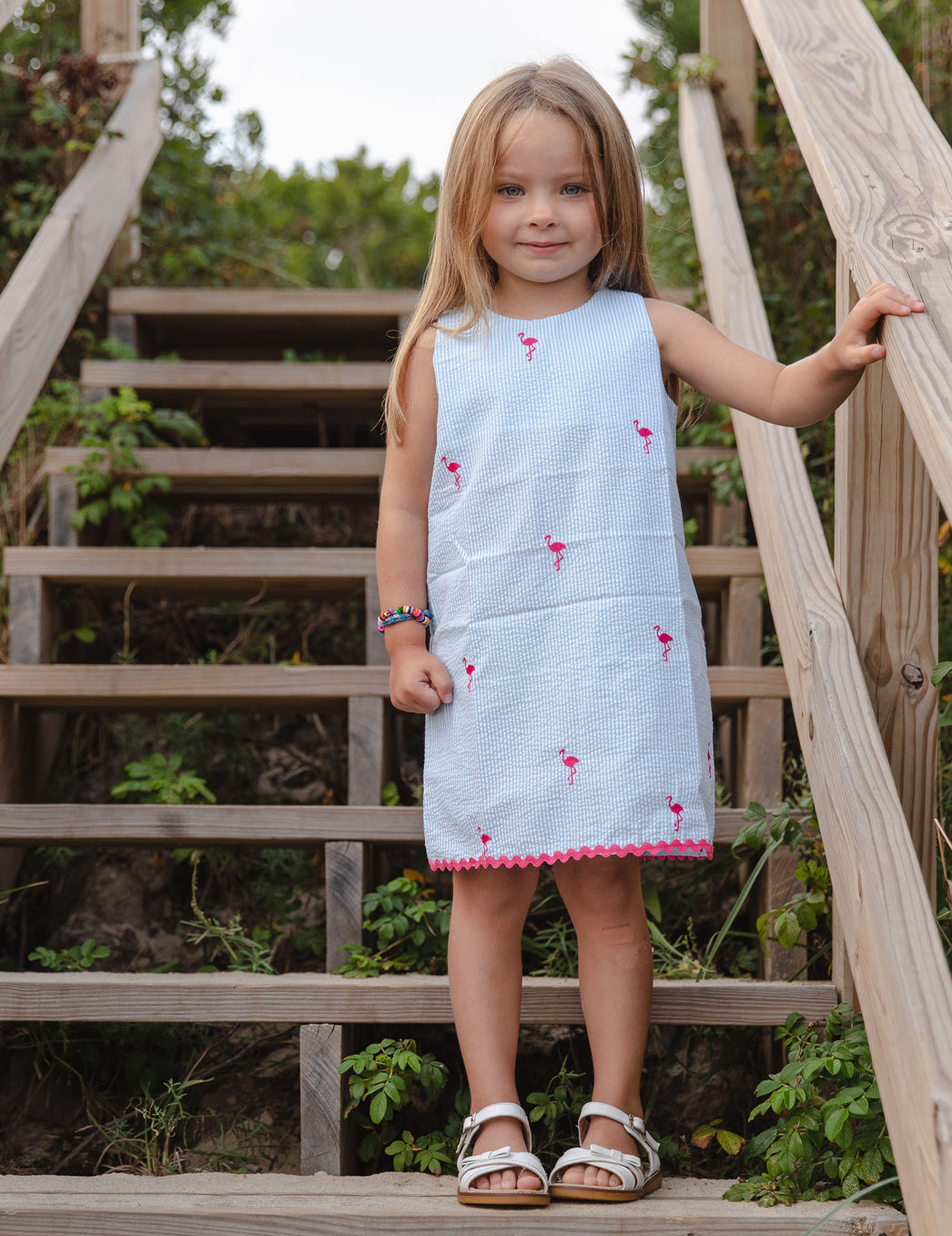 Turquoise Seersucker Girls Dress with Pink Embroidered Flamingos
